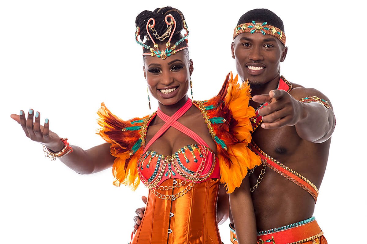 Joyful African couple in outfits Joyful African couple in outfits