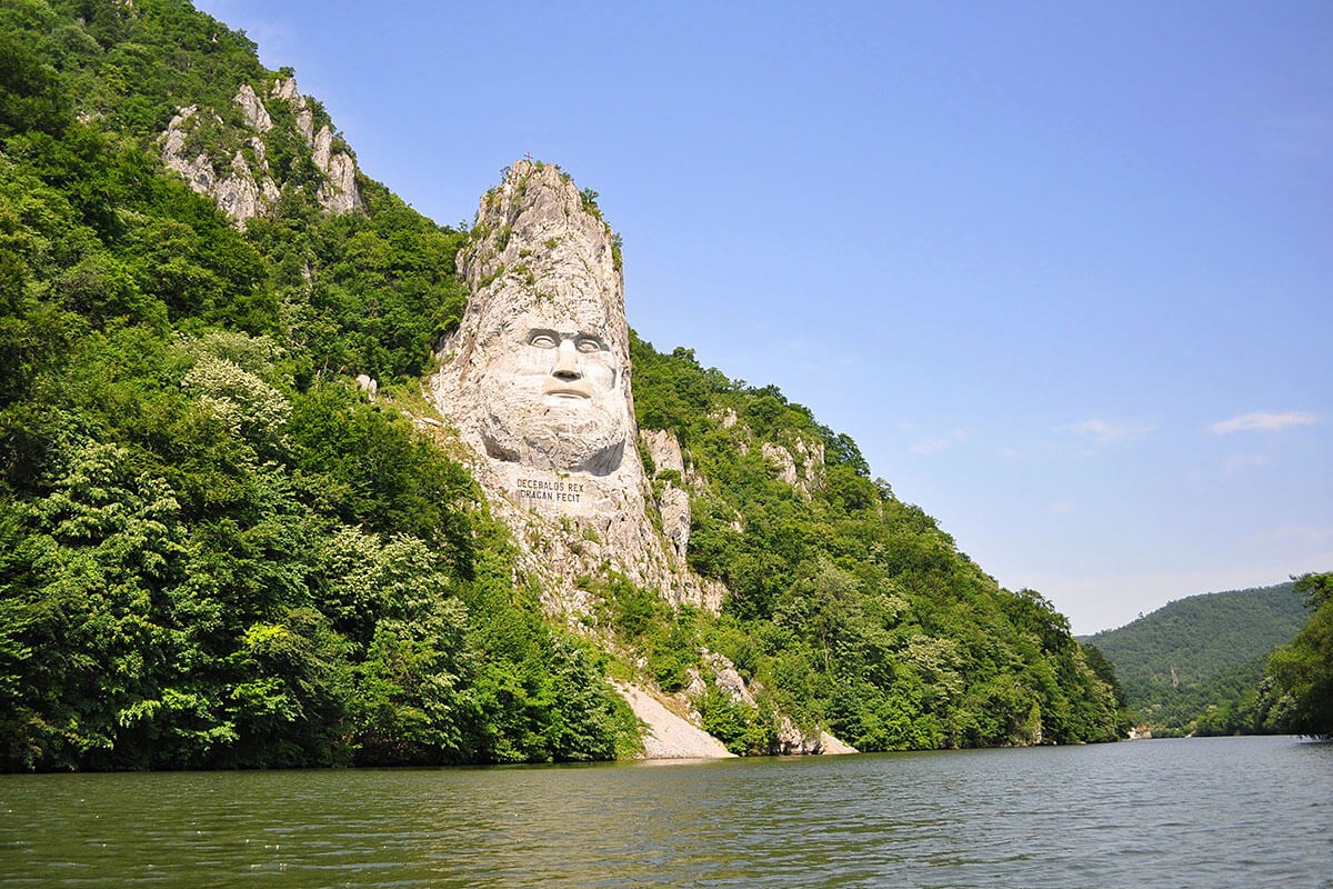 Rock Sculpture of Decebalus and a view of the Danube, Romania Rock Sculpture of Decebalus and a view of the Danube, Romania