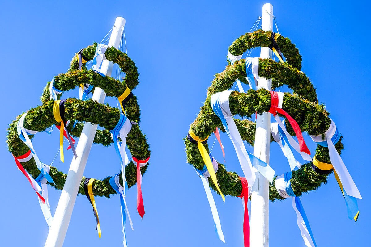 Bavarian Maypole and blue sky, Austria Bavarian Maypole and blue sky, Austria