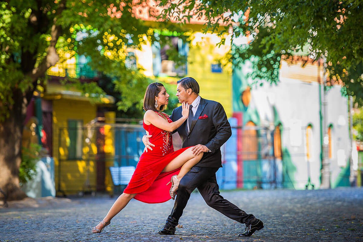 Man and woman dance tango at the Feria de San Telmo Sunday Fair event, Argentina Man and woman dance tango at the Feria de San Telmo Sunday Fair event, Argentina