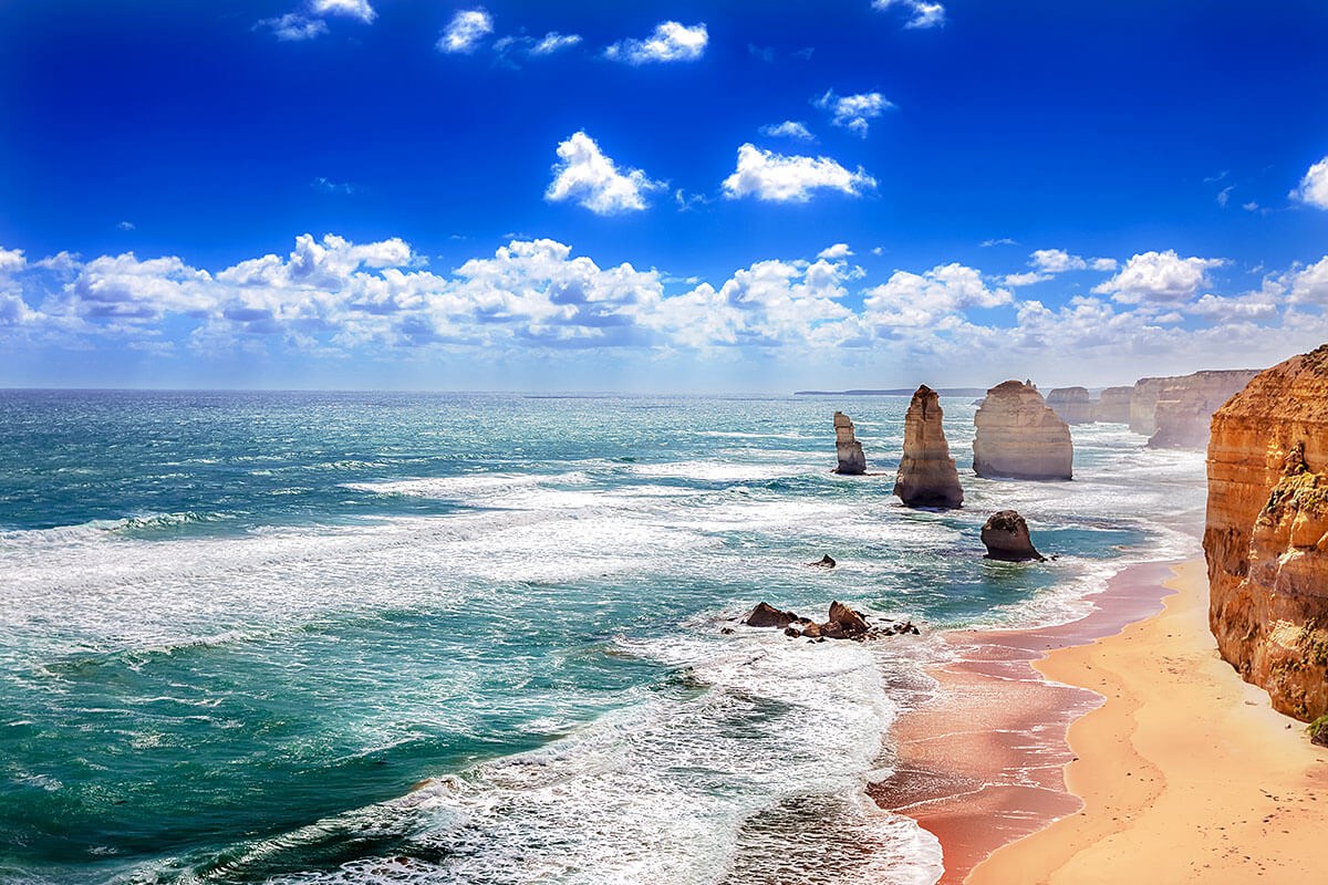 Twelve Apostles and orange cliffs along, Australia