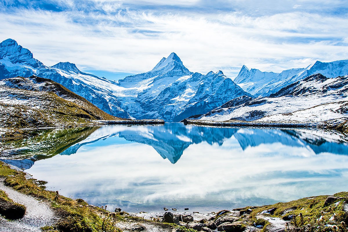Image of magnificent mountains and lake in Swiss Alps, Switzerland Image of magnificent mountains and lake in Swiss Alps, Switzerland