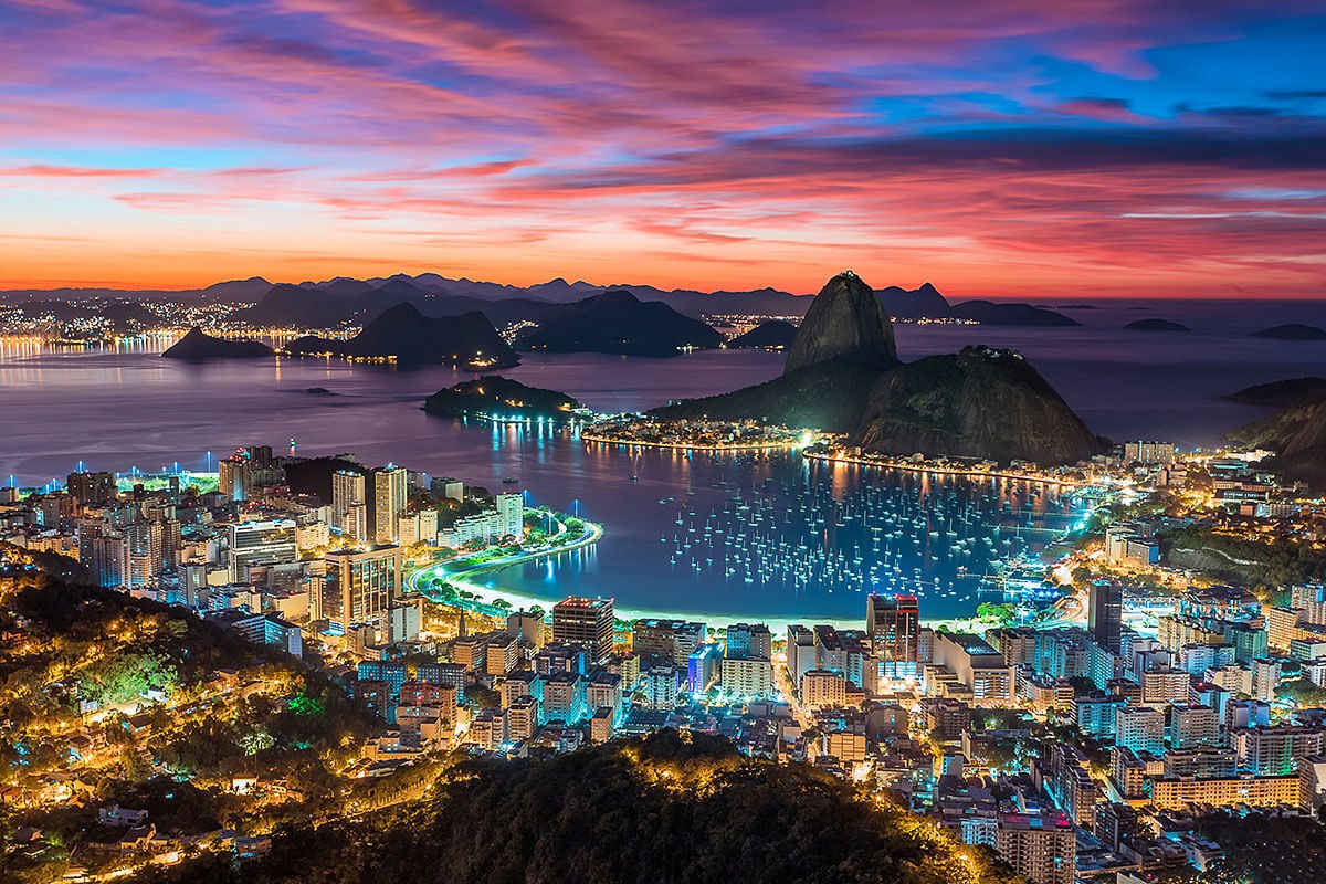 Panoramic view of the large city and amazing sunset in Rio de Janeiro Panoramic view of the large city and amazing sunset in Rio de Janeiro