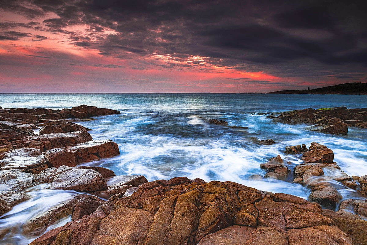 Image of beautiful cliffs and red sunset, Newcastle, Australia