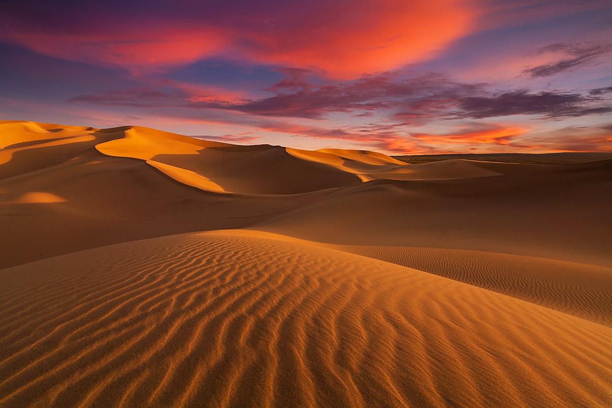 Beautiful view of the Sahara Desert and red sunset Beautiful view of the Sahara Desert and red sunset
