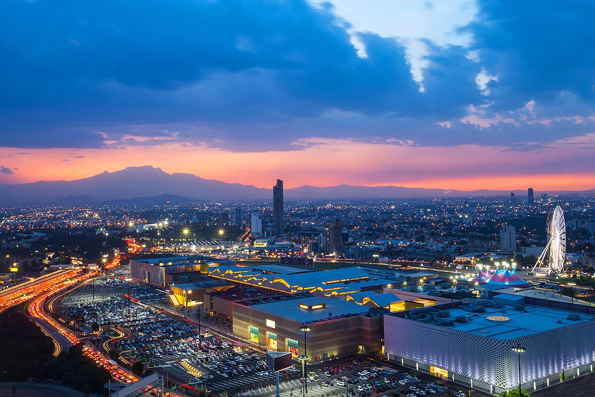 Aerial view of the infrastructure at the time of sunset in the city Puebla, Mexico Aerial view of the infrastructure at the time of sunset in the city Puebla, Mexico