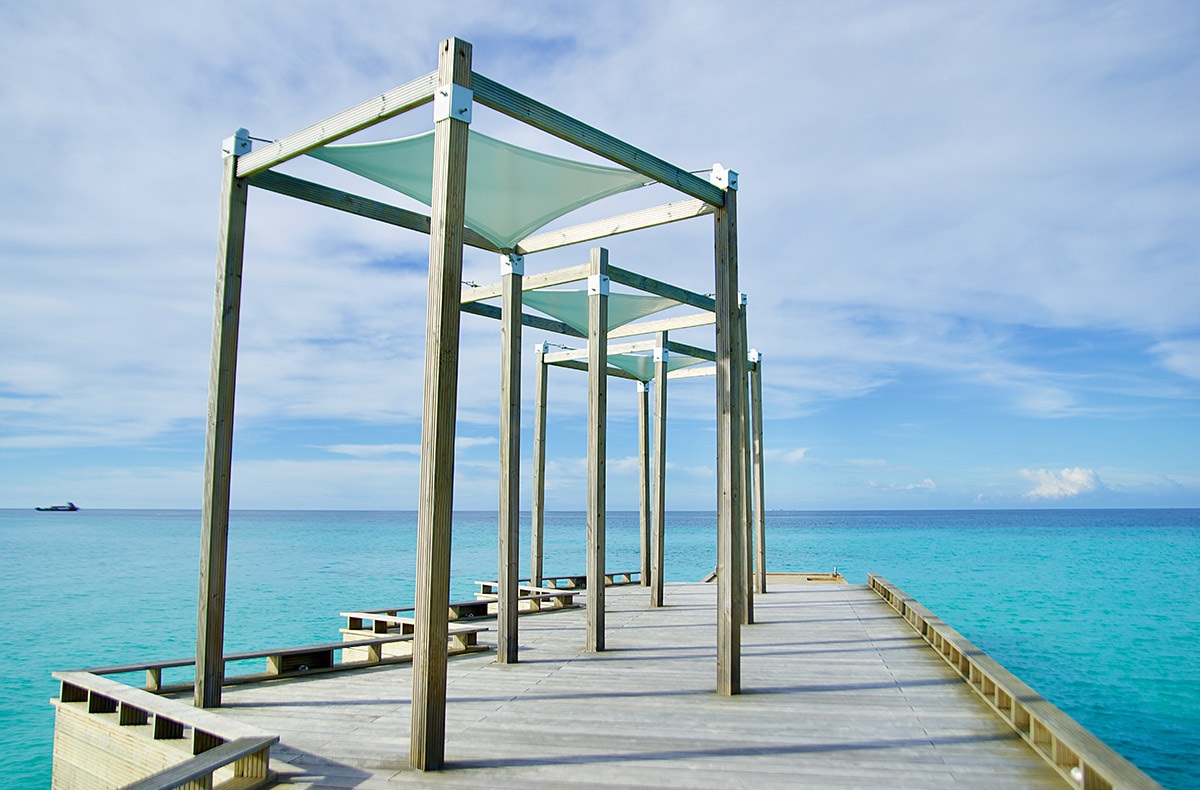 View of the Indian Ocean and blue sky, island of Kuramathi View of the Indian Ocean and blue sky, island of Kuramathi