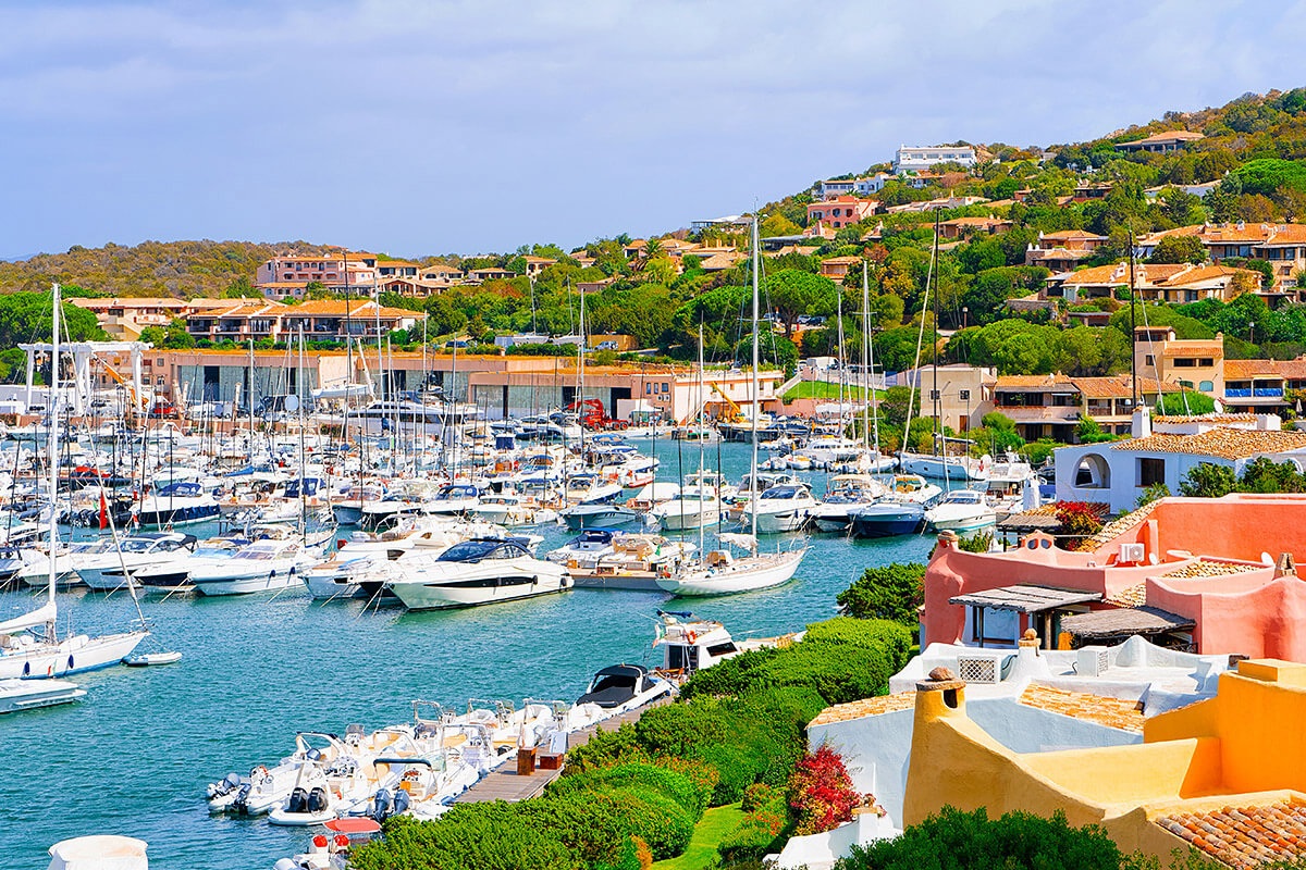 Image of a pier with yachts on the island of Sardinia, Italy Image of a pier with yachts on the island of Sardinia, Italy
