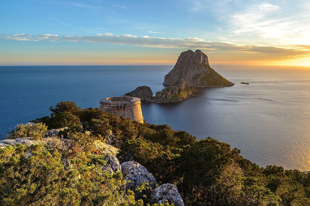 View of the tower and the sea at the time of sunset, Ibiza, Spain
