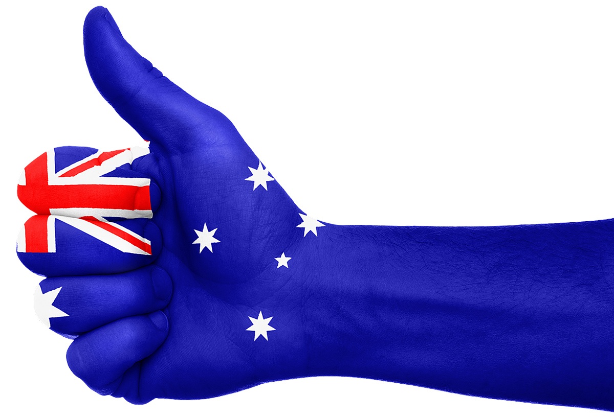 Human hand and flag of Australia