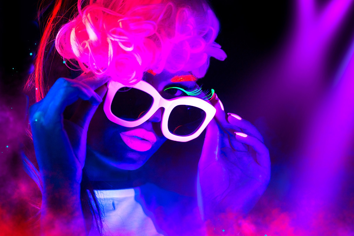 Image of a girl with glasses in neon colors Image of a girl with glasses in neon colors