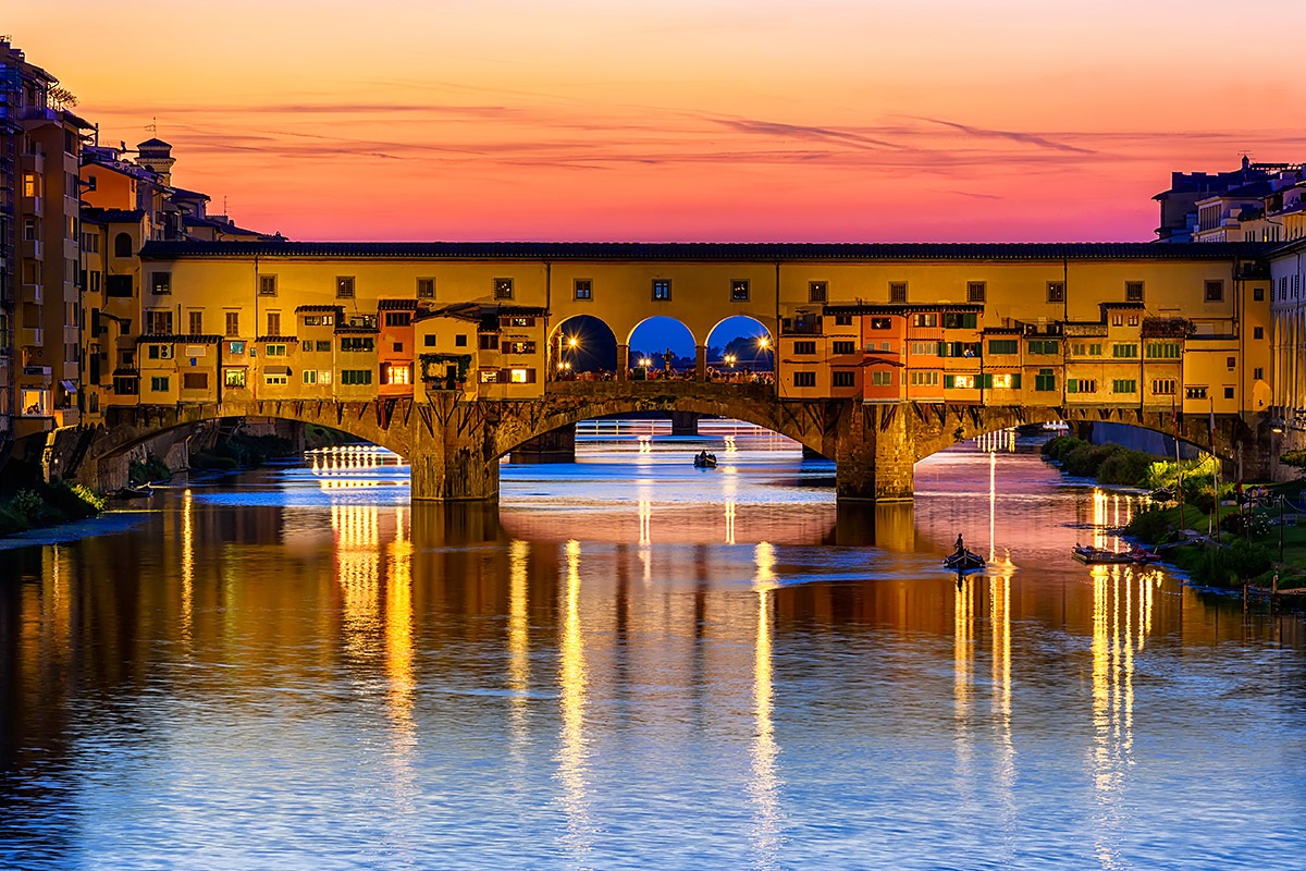 Sunset view of the Ponte Vecchio and the Arno River in Florence, Italy Sunset view of the Ponte Vecchio and the Arno River in Florence, Italy