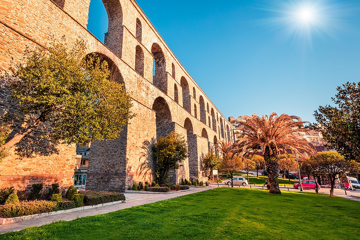 Cityscape with the medieval Kamares aqueduct in the city of Kavala, Greece Cityscape with the medieval Kamares aqueduct in the city of Kavala, Greece