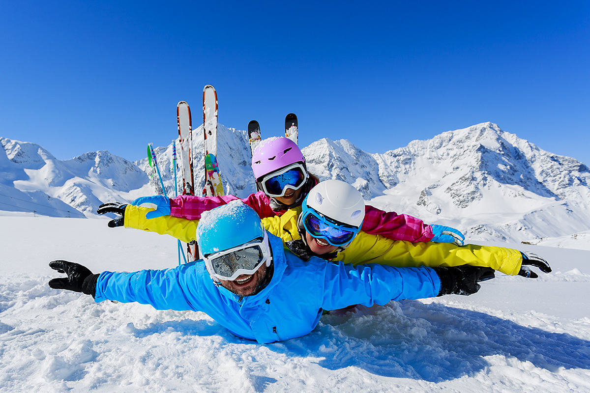Image of a happy family in a ski resort Image of a happy family in a ski resort