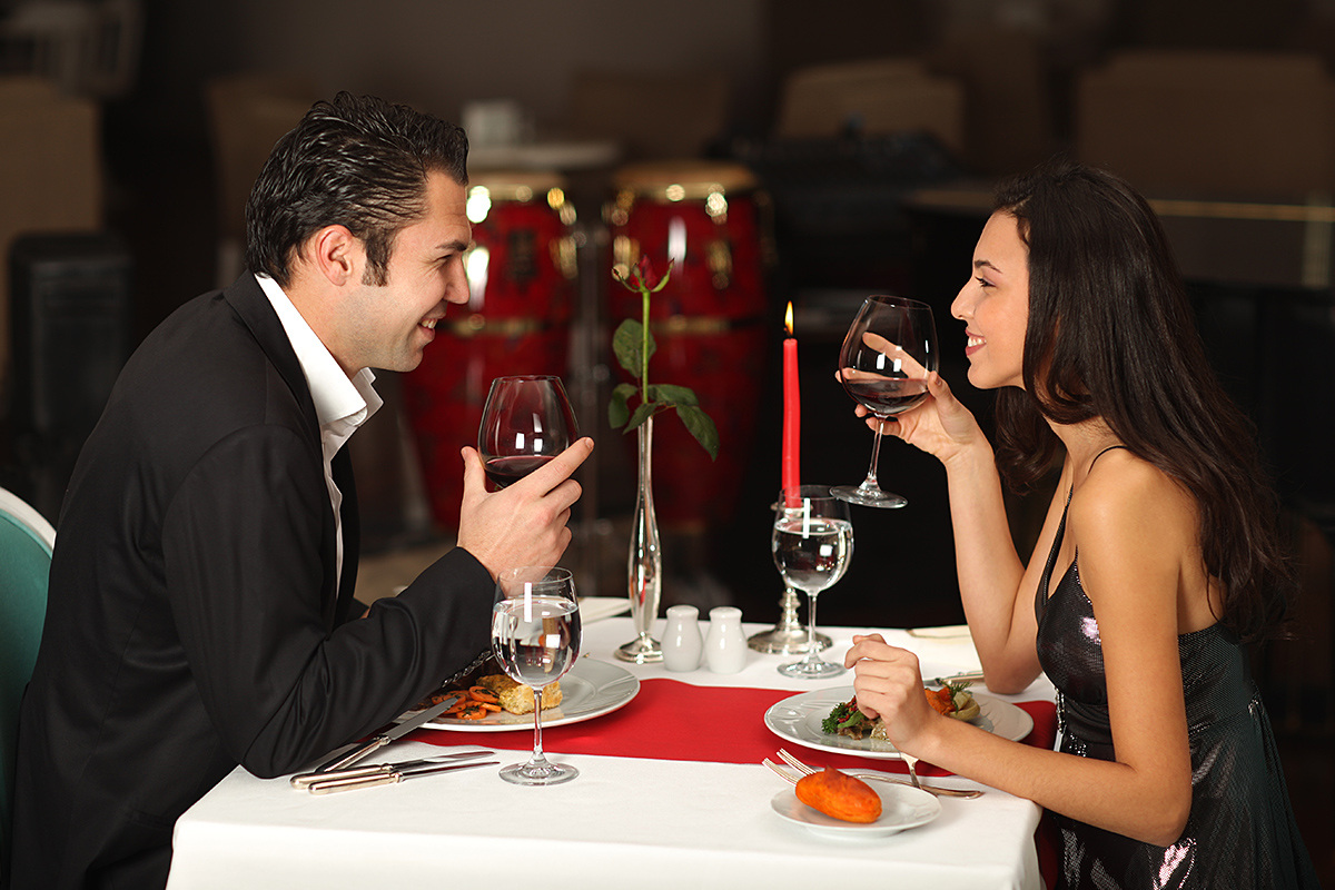 Man and woman celebrating New Year in a restaurant Man and woman celebrating New Year in a restaurant