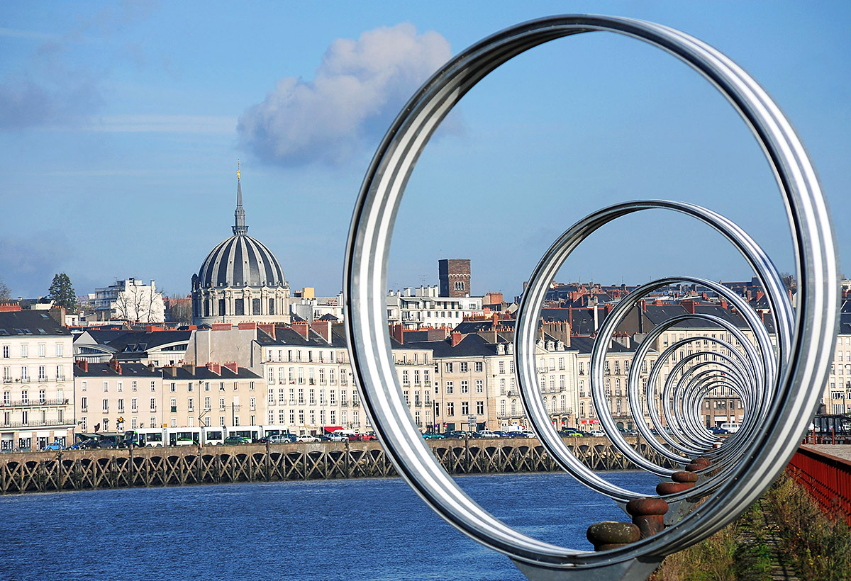 Beautiful view of the Loire River and the metal rings of the Buren, Nantes City Beautiful view of the Loire River and the metal rings of the Buren, Nantes City