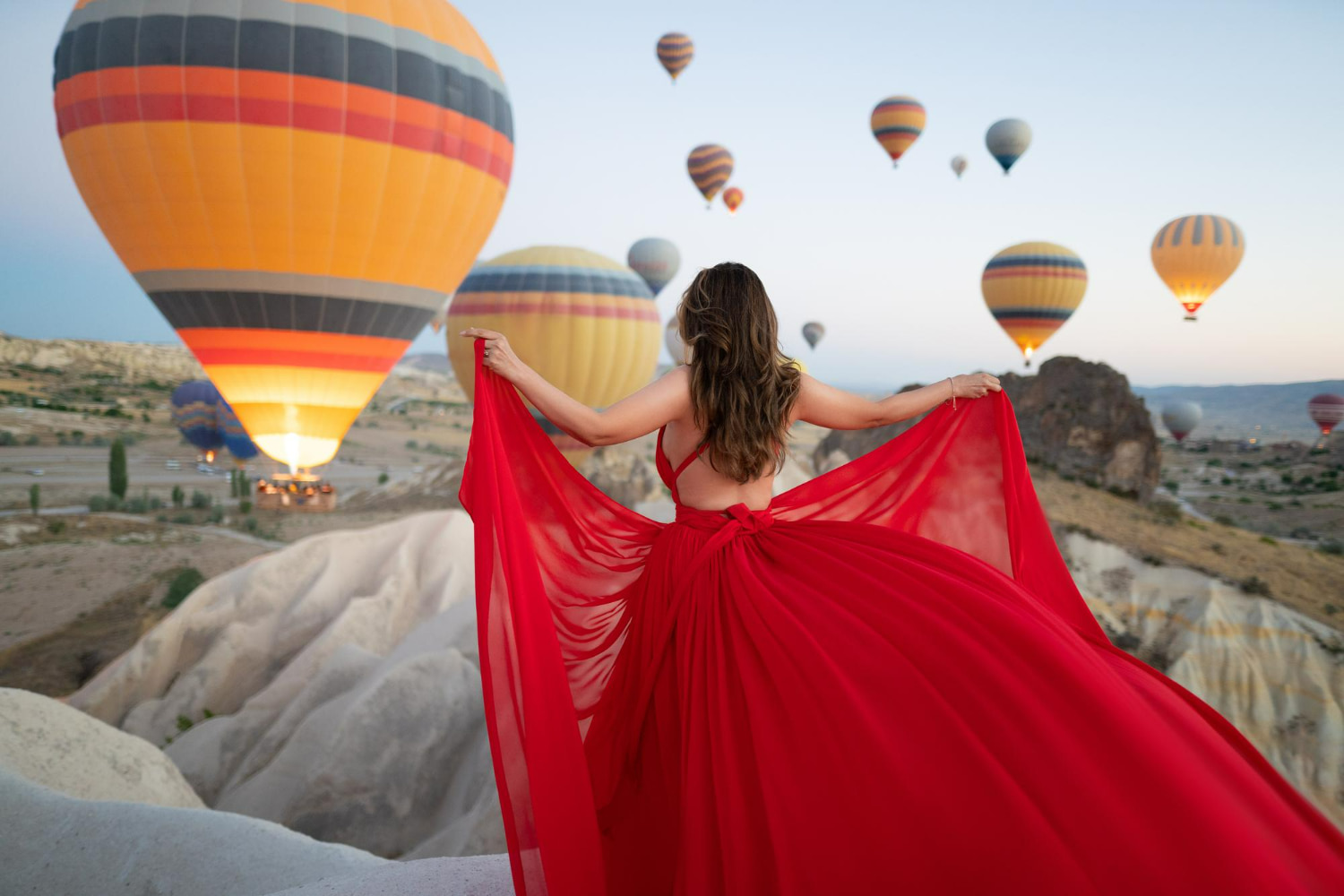 The scene perfectly encapsulates the sense of freedom and wonder that defines the Cappadocia experience.